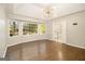 Bright main bedroom with hardwood floors, bay window and ensuite bath at 1241 Lambeth Se Way, Conyers, GA 30013