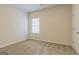 Bedroom with window, door and neutral carpet at 359 Orwell Dr # 53, Social Circle, GA 30025