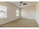 Light-filled bedroom with neutral carpet, bright windows, and a white door ready to personalize and create your retreat at 359 Orwell Dr # 53, Social Circle, GA 30025