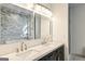 Bathroom boasts double vanity and marble countertop at 2611 Charlesgate Ave, Decatur, GA 30030