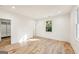 Light-filled bedroom with hardwood floors and closet access at 2611 Charlesgate Ave, Decatur, GA 30030