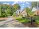 Two-story house with stone accents and landscaping at 7445 Talbot Colony, Sandy Springs, GA 30328