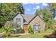 House exterior featuring stone and gray siding at 7445 Talbot Colony, Sandy Springs, GA 30328