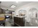 Modern kitchen featuring an island, stainless steel appliances, dark wood cabinets and dark hardwood floors at 7445 Talbot Colony, Sandy Springs, GA 30328