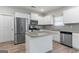 Modern kitchen featuring stainless steel appliances and granite countertops at 8069 Louis Dr, Locust Grove, GA 30248