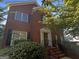 Charming brick home featuring black shutters, manicured landscaping and a welcoming front entrance at 200 Eagle Glen Ct, Woodstock, GA 30189