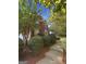 Charming brick home featuring black shutters, manicured landscaping and a welcoming walkway at 200 Eagle Glen Ct, Woodstock, GA 30189