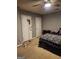 Spacious bedroom with carpet flooring and ample closet space at 9388 Crest Knoll Ct, Jonesboro, GA 30238