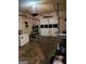 Attached garage with automatic opener and storage shelving at 9388 Crest Knoll Ct, Jonesboro, GA 30238