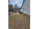 Side yard with visible AC unit and grassy area at 9388 Crest Knoll Ct, Jonesboro, GA 30238
