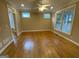 Hardwood floor living room with fireplace and lots of natural light at 1009 Longley Nw Ave, Atlanta, GA 30318