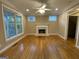 Bright living room with hardwood floors, fireplace and French doors at 1009 Longley Nw Ave, Atlanta, GA 30318