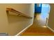 View of wooden staircase from above, showing hardwood floors below at 1009 Longley Nw Ave, Atlanta, GA 30318