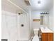 Basement bathroom with shower, toilet and vanity at 1092 W Adrian Sw Cir, Conyers, GA 30094