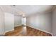 Bright bedroom with wood-look floors and ceiling fan at 1092 W Adrian Sw Cir, Conyers, GA 30094