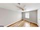 Spacious bedroom with wood-look floors and a window at 1092 W Adrian Sw Cir, Conyers, GA 30094