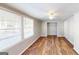 Bedroom with wood-look floors, windows and closet at 1092 W Adrian Sw Cir, Conyers, GA 30094
