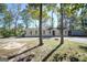 Ranch house with front yard and driveway at 1092 W Adrian Sw Cir, Conyers, GA 30094