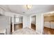 Kitchen with stainless steel appliances and access to laundry and dining area at 1092 W Adrian Sw Cir, Conyers, GA 30094