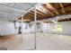 Unfinished basement featuring exposed ceiling, support beams, and block wall construction ready for customization at 504 Milligan Dr, Stone Mountain, GA 30083