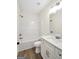 Bright bathroom featuring modern vanity, shower over tub, and neutral finishes at 241 Ben Horton Dr, Mcdonough, GA 30253