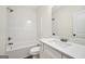 Clean, bright bathroom featuring a tub and shower combination with a white vanity and countertop at 241 Ben Horton Dr, Mcdonough, GA 30253