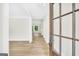 Bright foyer with wood flooring and a clear view into the expansive, light-filled interior at 241 Ben Horton Dr, Mcdonough, GA 30253