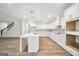 Bright kitchen featuring white cabinets, a large island, and stainless steel appliances at 241 Ben Horton Dr, Mcdonough, GA 30253