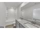 Bathroom with double vanity, granite countertop, and a bathtub at 209 Weldon Rd # 43, Mcdonough, GA 30253