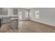 Open kitchen with gray cabinets, granite countertops, and an island at 209 Weldon Rd # 43, Mcdonough, GA 30253
