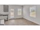 Modern kitchen featuring gray cabinets and granite countertops at 209 Weldon Rd # 43, Mcdonough, GA 30253