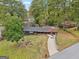 A high-angle view showcases this home and its lush, green surroundings at 1973 Glendale Dr, Decatur, GA 30032
