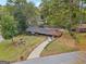 An aerial perspective of a well-situated home surrounded by mature trees at 1973 Glendale Dr, Decatur, GA 30032
