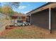 A fenced-in yard with home's exterior, offering a unique outdoor space at 1973 Glendale Dr, Decatur, GA 30032