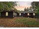 The backyard of this home features green grass and several trees at 1973 Glendale Dr, Decatur, GA 30032