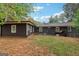 The property features a tree-filled yard with an accessory structure at 1973 Glendale Dr, Decatur, GA 30032