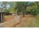 A fenced-in yard, enhanced by mature trees, offers a private outdoor retreat at 1973 Glendale Dr, Decatur, GA 30032