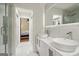 This updated bathroom is conveniently located near the primary bedroom and features a double vanity at 1973 Glendale Dr, Decatur, GA 30032