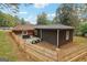 A modern-looking exterior with a wooden fence surrounding the property at 1973 Glendale Dr, Decatur, GA 30032
