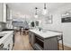 Modern kitchen with a large island, stainless steel appliances, and an open layout to living areas at 1973 Glendale Dr, Decatur, GA 30032