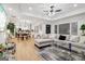 Spacious living room seamlessly connecting to a modern kitchen and dining area with natural light at 1973 Glendale Dr, Decatur, GA 30032