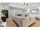 Inviting living room featuring a contemporary fireplace, cozy gray sectional sofa and view to the bedroom at 1973 Glendale Dr, Decatur, GA 30032