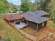 Aerial view of the home featuring a wooden fence and tire swing in the backyard at 1973 Glendale Dr, Decatur, GA 30032