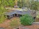 Aerial view of the home with a spacious backyard and mature trees at 1973 Glendale Dr, Decatur, GA 30032