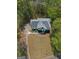 Aerial view of the home showcasing its well-maintained lawn and classic exterior at 22 Agean Way, Whitesburg, GA 30185