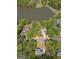 Aerial view showing the homes, waterfront access and serene lake views at 22 Agean Way, Whitesburg, GA 30185