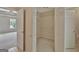 Walk-in closet with shelving, perfect for storing clothes and accessories at 22 Agean Way, Whitesburg, GA 30185