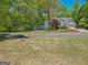 Charming home with manicured lawn and lake view in a beautiful, serene neighborhood at 22 Agean Way, Whitesburg, GA 30185