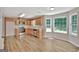 Bright kitchen with stainless steel appliances, light wood cabinets, and plenty of natural light at 22 Agean Way, Whitesburg, GA 30185