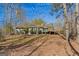 Ranch home with deck, nestled in a wooded setting at 785 Seabolt Rd, Locust Grove, GA 30248